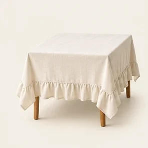 Ivory Ruffle Tablecloth — illustrative design reference