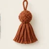 Rust Cotton Tassel — illustrative design reference