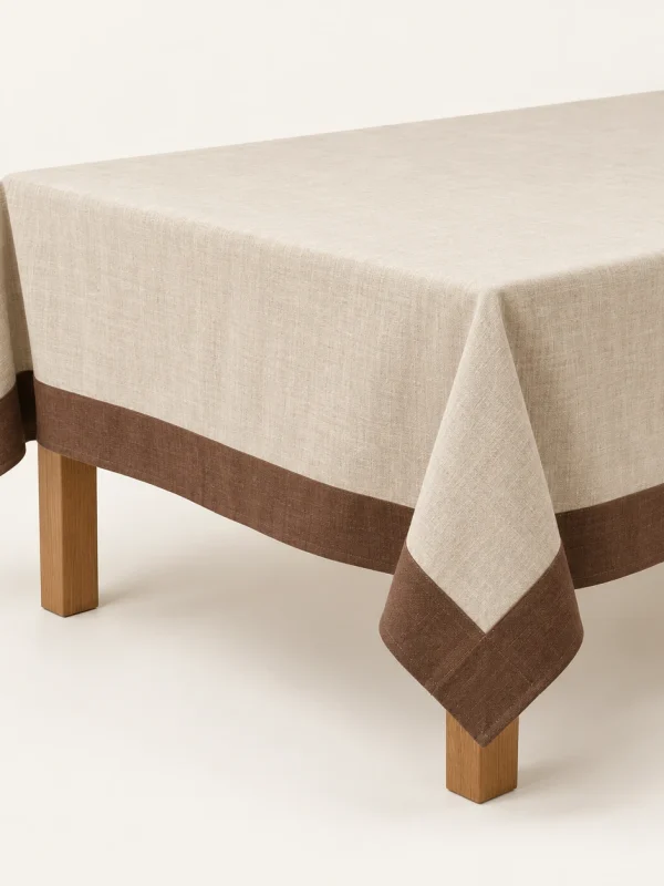 Cocoa Border Tablecloth on a warm ivory background — AI-generated design illustration