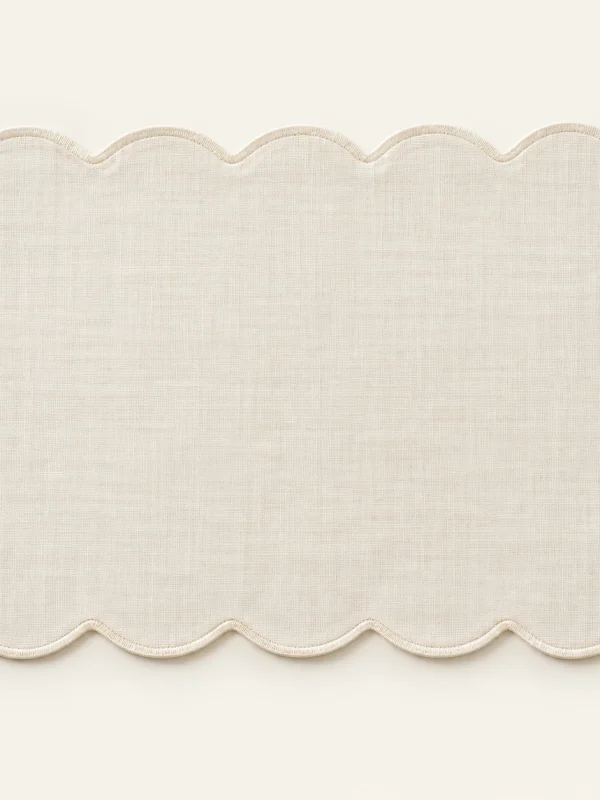 Ivory Scallop Placemat on a warm ivory background — AI-generated design illustration