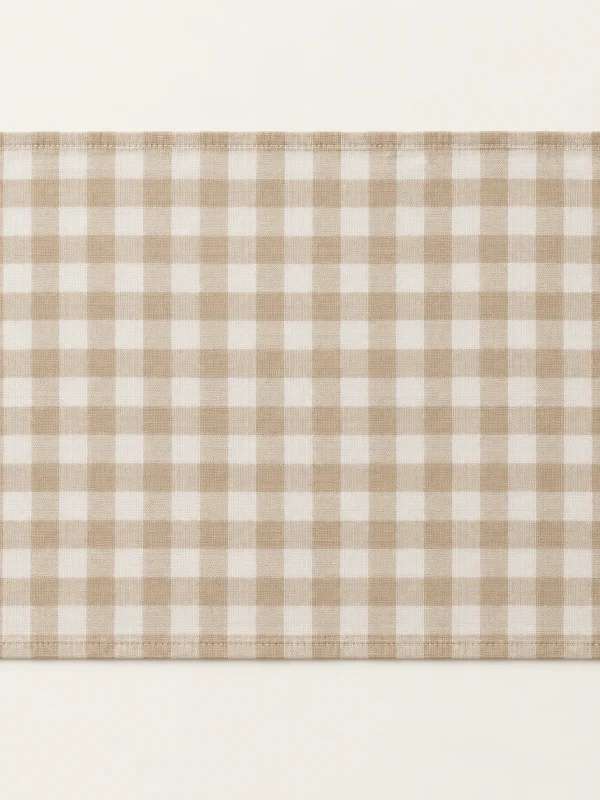 Gingham Cloth Placemat on a warm ivory background — AI-generated design illustration