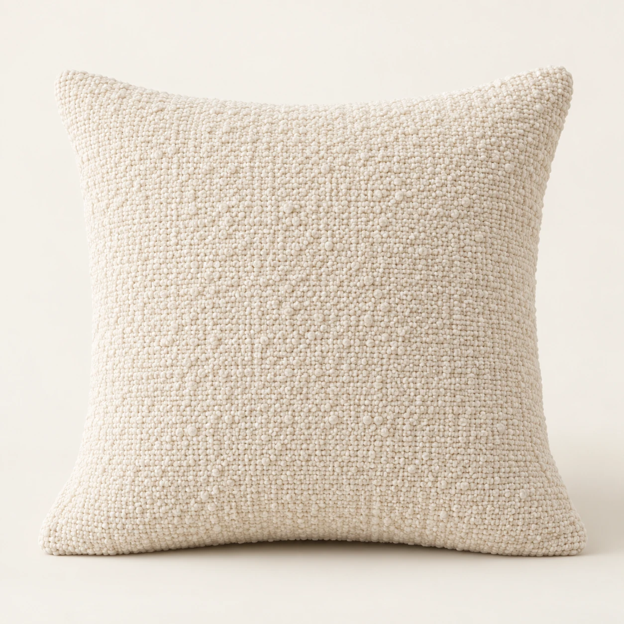 Ivory Boucle Cushion Cover on a warm ivory background — AI-generated design illustration