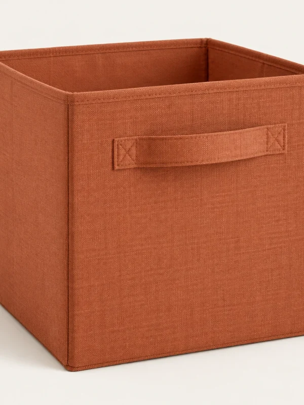 Terracotta Storage Cube on a warm ivory background — AI-generated design illustration