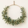 Sage Wreath Hoop on a warm ivory background — AI-generated design illustration