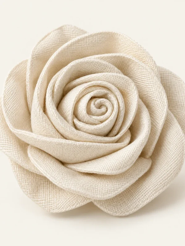 Ivory Fabric Rosette on a warm ivory background — AI-generated design illustration